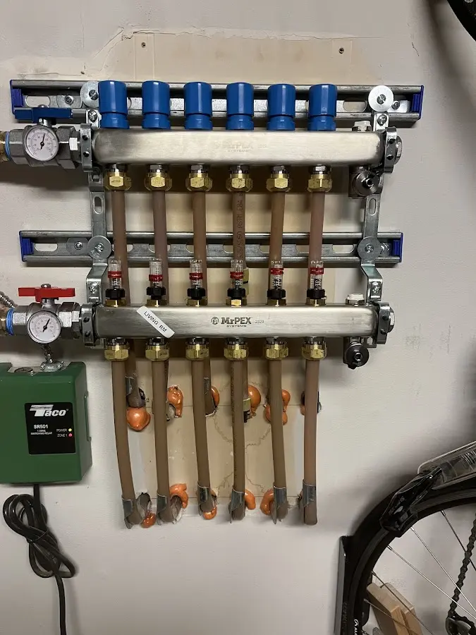 Plumber performing Gas Line Installation at a residential property in Auberry